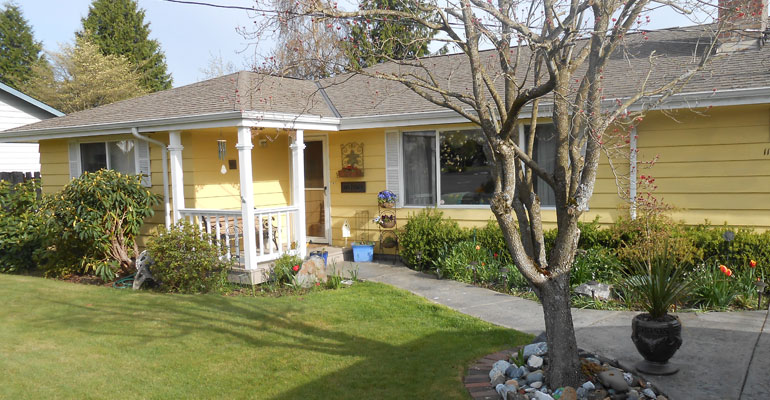 Photo of a house representing option to stay at home of a host family